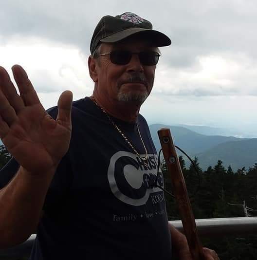 Mike one our certified rv inspectors with a mountain view behind him 